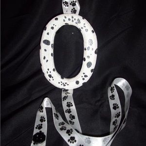 Handmade letter O black white Dalmatian paw print